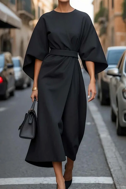 Sofía - elegante vestido con mangas abullonadas y cinturón.